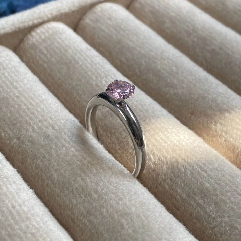 platinum plated silver ring with pink stone